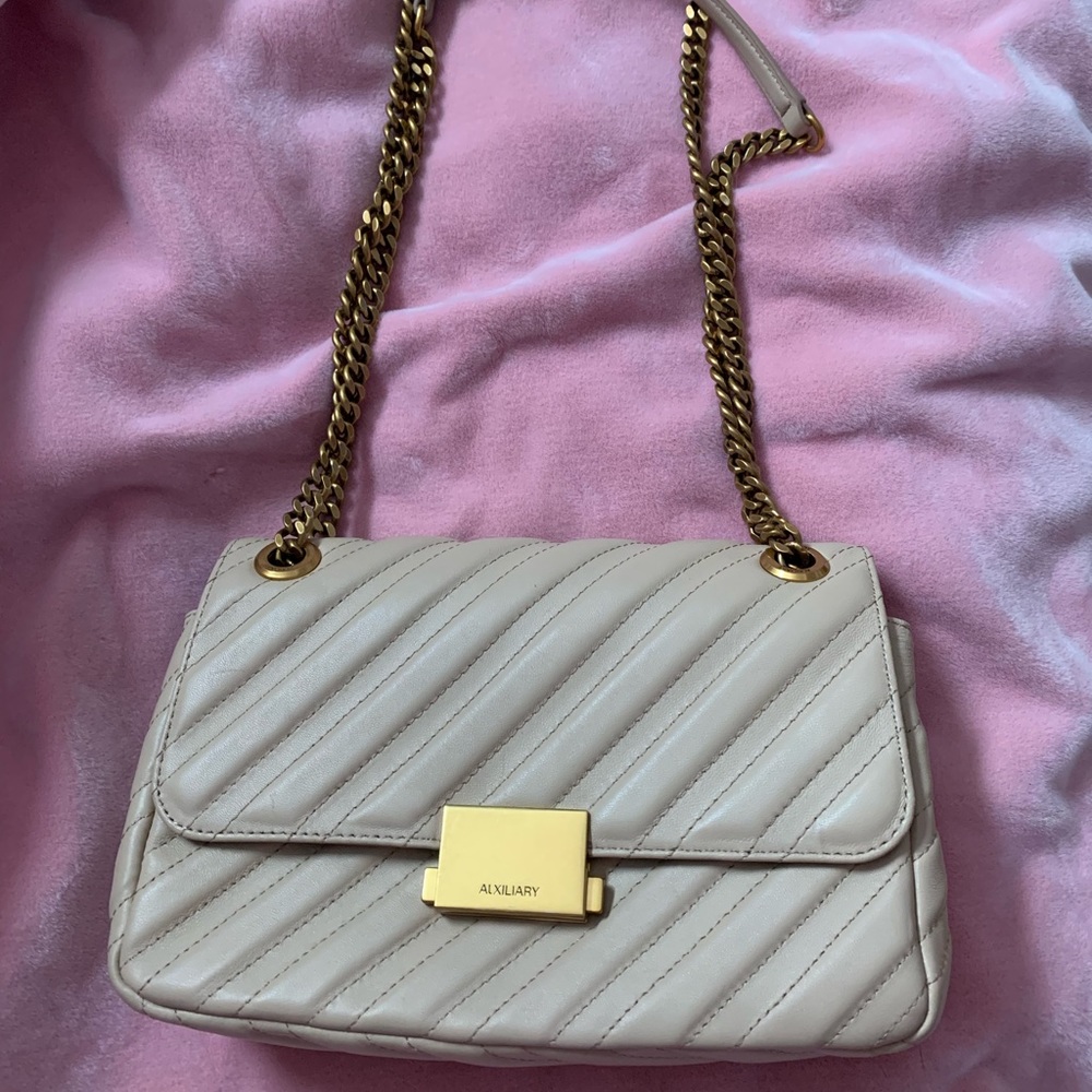 Auxiliary
Leather Flap Bag